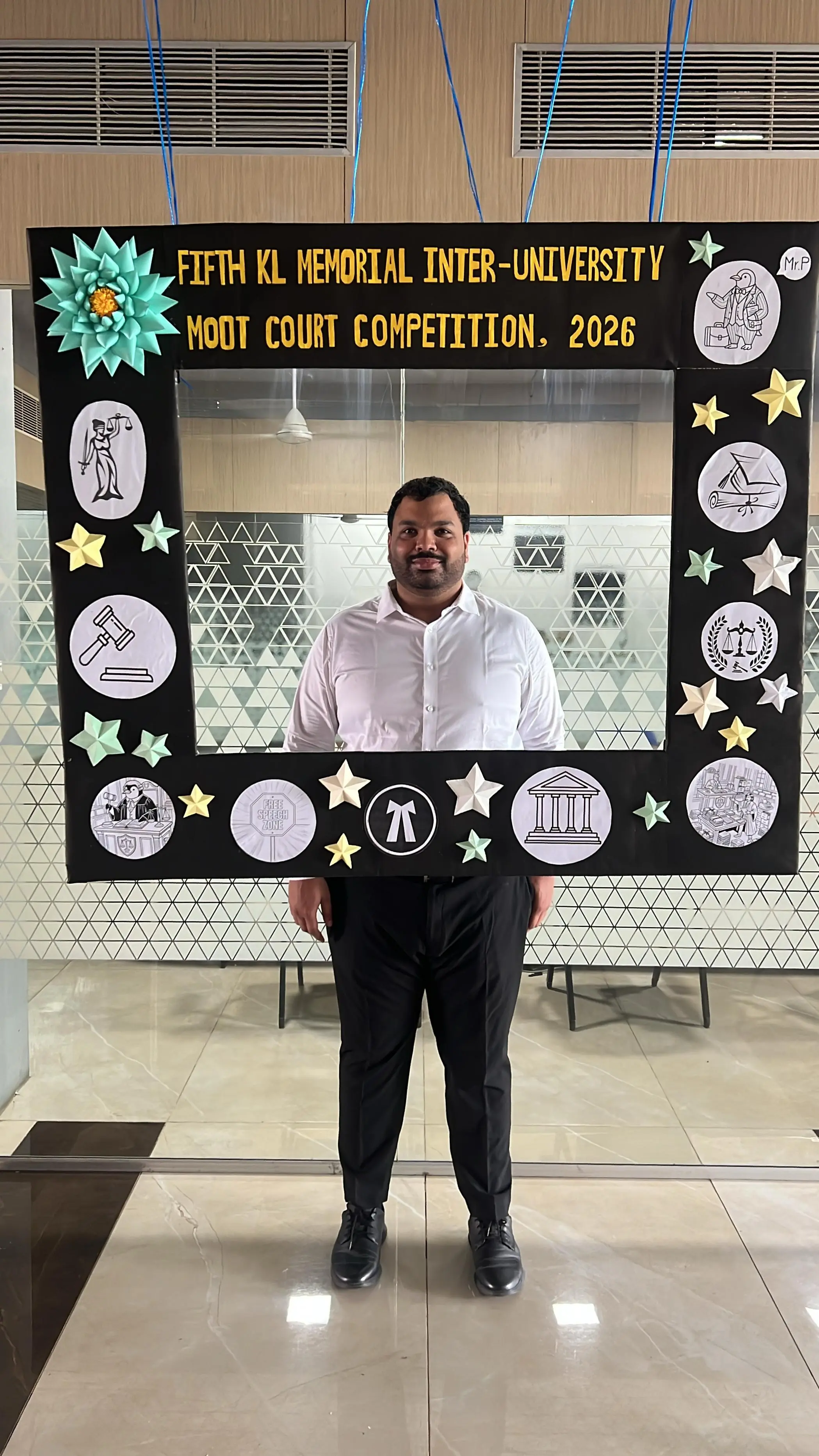 Me posing at the KLU Moot Court photo frame